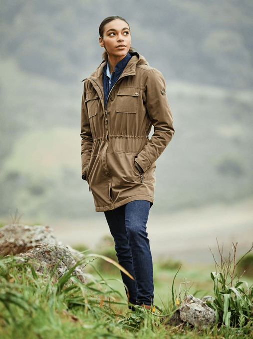 woman walking in ariat countryside jacket and shoes